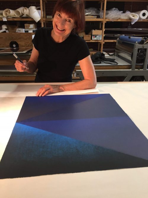 Kate Petley signing prints at Manneken Press